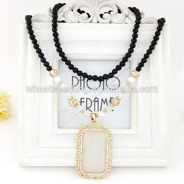 Cat's eye sweater chain necklace with black beads